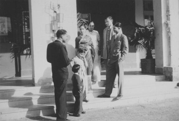 The Jain family outside Kumar Gallery in 1962. Standing, left to right: Virendra, Sunit, Vinit, Kamal, Prakashwati, Kanshi Ram, and Ravi